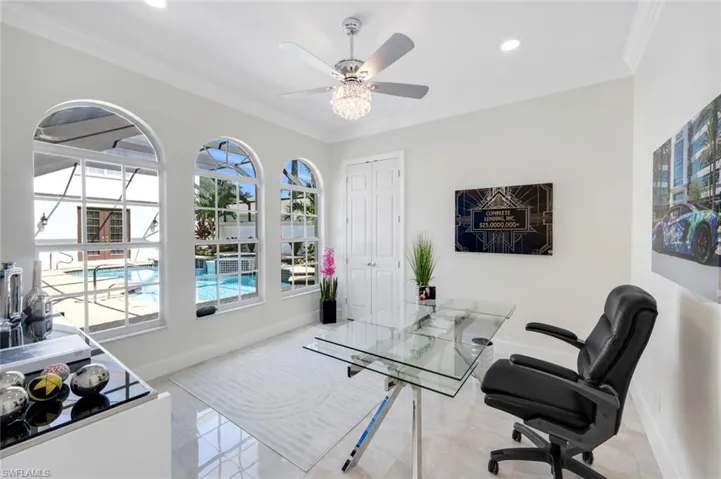 Home office with ornamental molding, recessed lighting, a ceiling fan, a sunroom, and light tile patterned floors