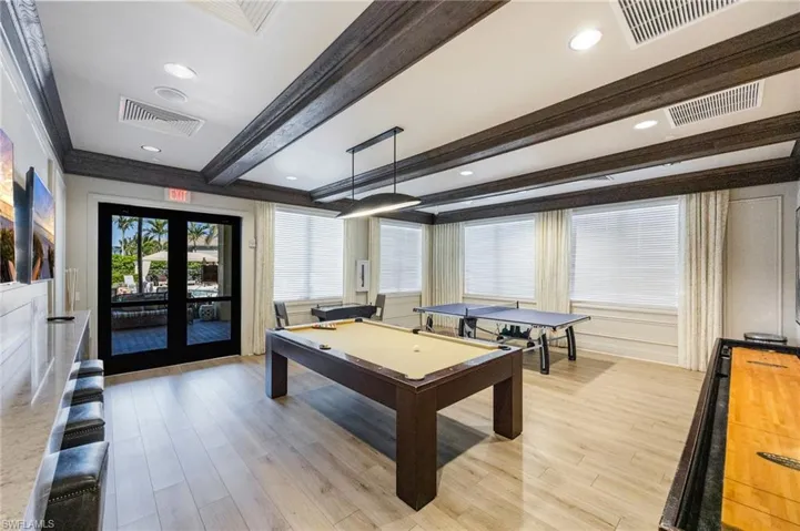 Game room featuring beam ceiling, billiards table, recessed lighting, and french doors
