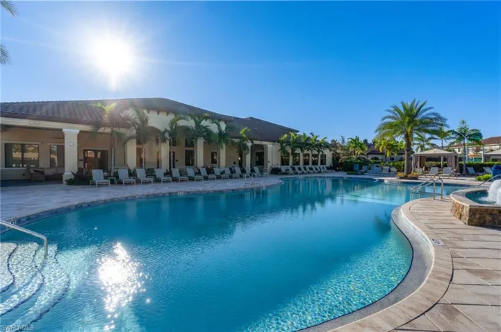 Community pool featuring a patio area