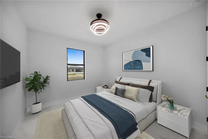 Bedroom featuring baseboards