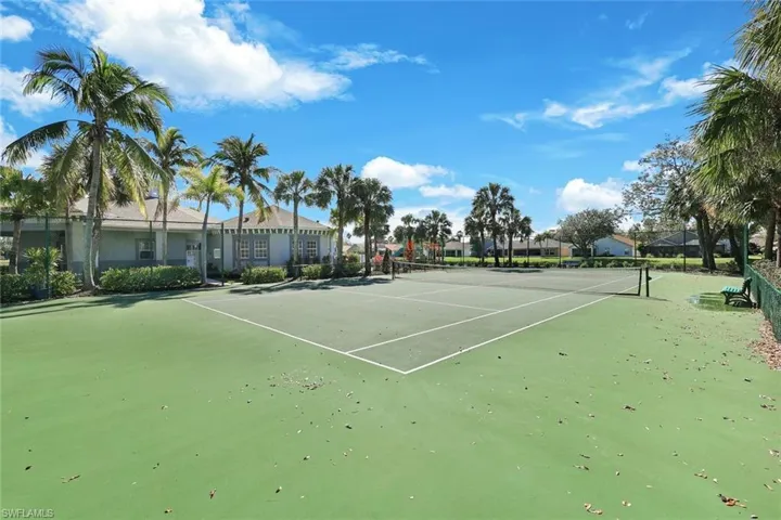 View of tennis court with fence