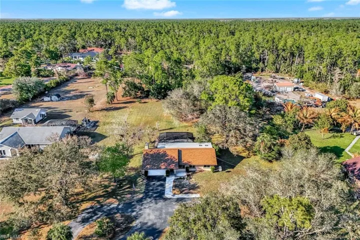 Drone / aerial view of a heavily wooded area