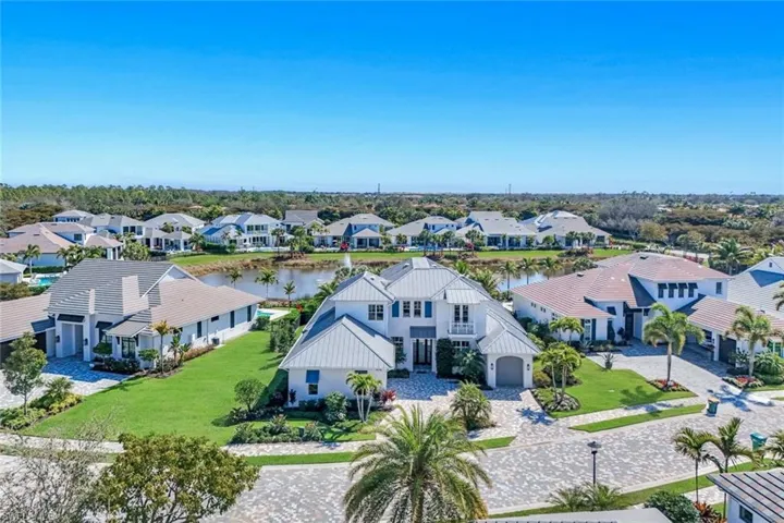 Aerial view of residential area with a large body of water