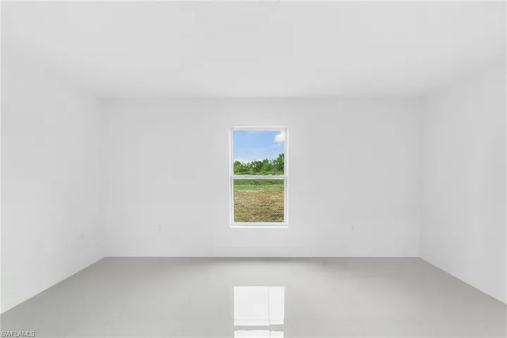 Empty room with baseboards