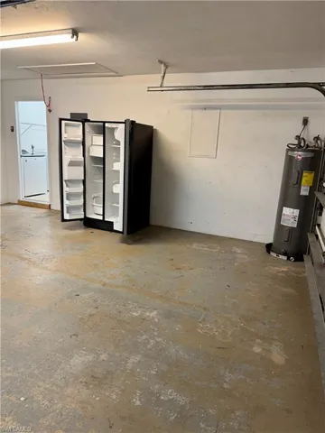 Two car garage and an extra ref/freezer plus additional storage room