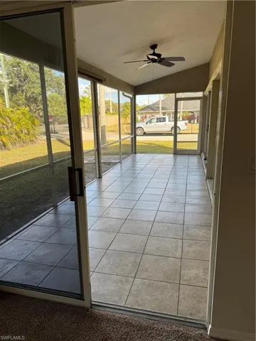 Large screened lanai with three sets of sliding doors to the interior. Two are pocket sliders so the house really opens up and offers a great floor plan/