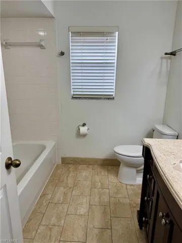 Nicely tiled guest bathroom