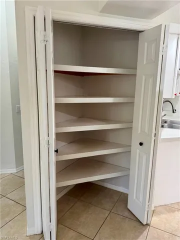 Great storage off the kitchen for all your canned goods, etc.