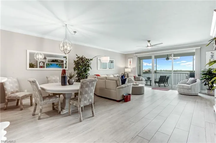 Wood like tile throughout the home except for carpet in the bedrooms. (Table shown is not the table there now)