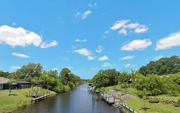 Water view with a boat dock