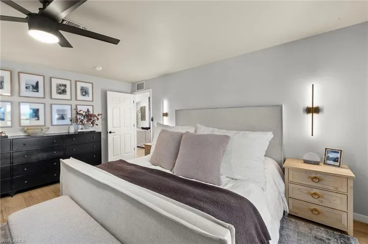 Bedroom with light wood-style flooring and ceiling fan