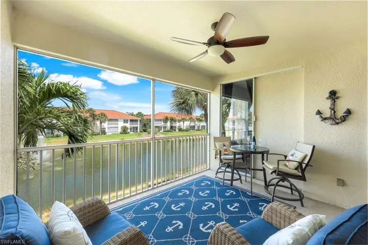 Lovely and bright lanai with beautiful water and fountain view, and plenty of space for multiple seating arrangements. Also features private access from the primary bedroom.