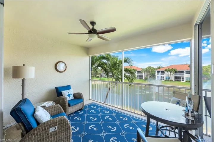 Lovely and bright lanai with beautiful water and fountain view, and plenty of space for multiple seating arrangements. Also features private access from the primary bedroom.