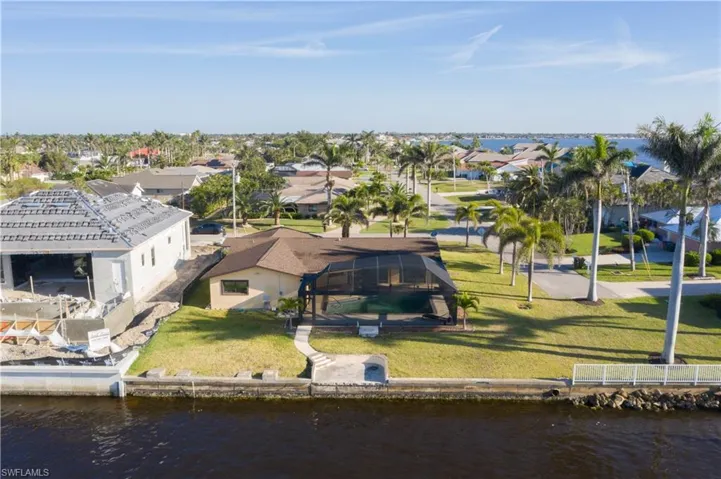 Bird's eye view featuring a water view and a residential view