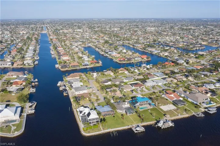 Bird's eye view with a residential view and a water view