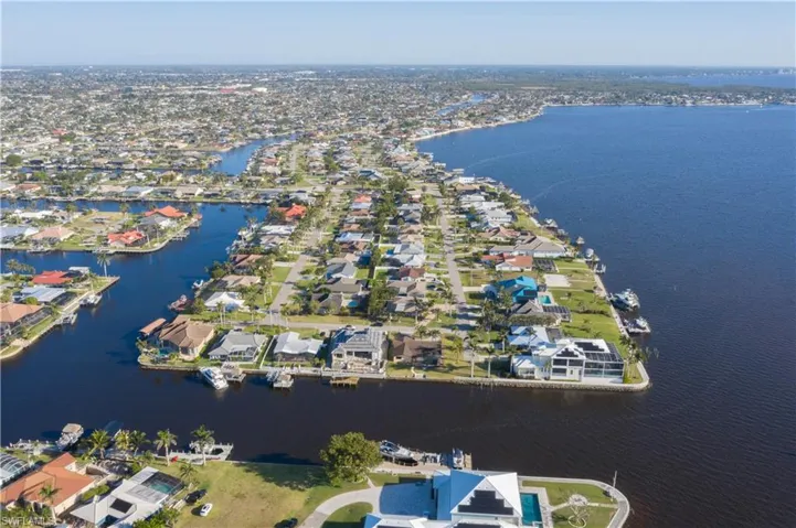 Drone / aerial view featuring a residential view and a water view