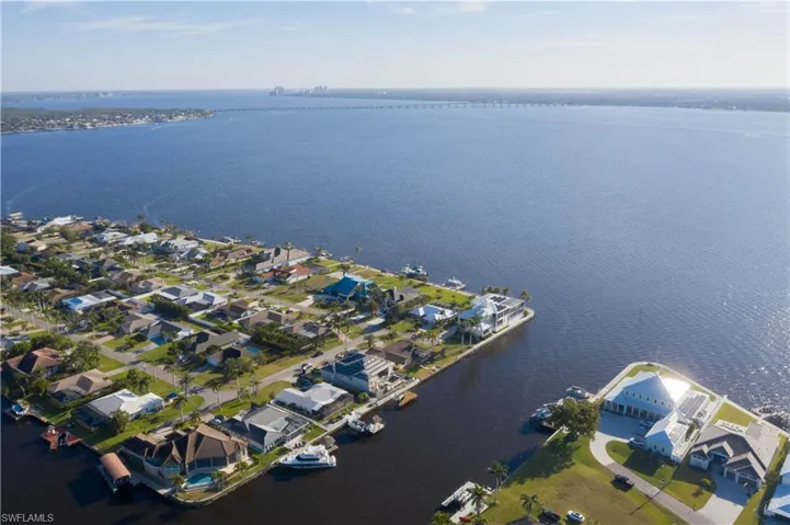Drone / aerial view featuring a residential view and a water view