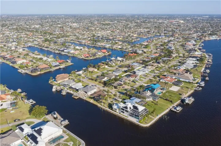 Bird's eye view with a residential view and a water view