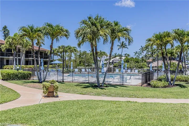 View of community featuring a swimming pool