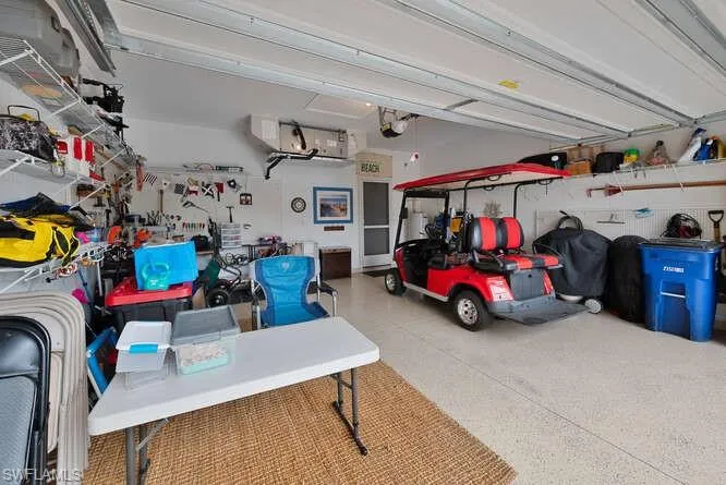 Garage featuring a garage door opener