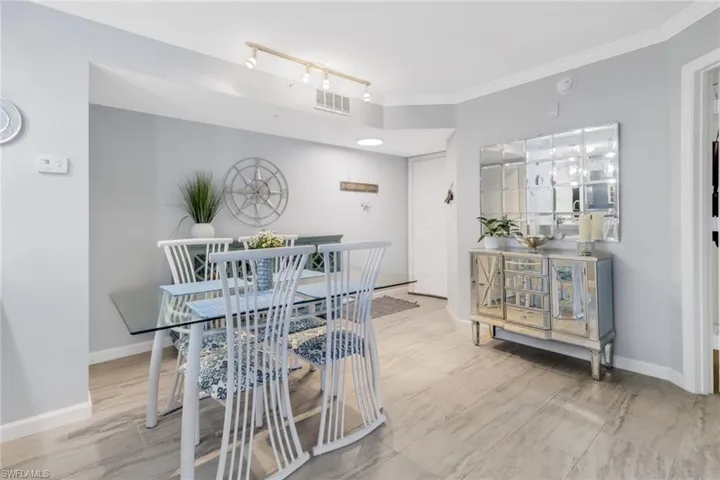 Dining space with track lighting