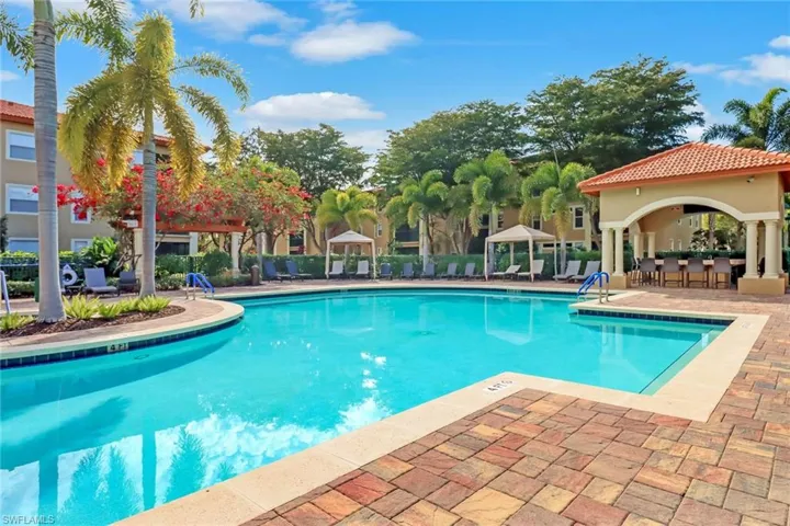 View of swimming pool with a gazebo and patio area