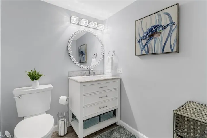 Bathroom with vanity and toilet