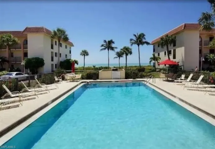 Sparkling Community Pool Overlooking the Beach