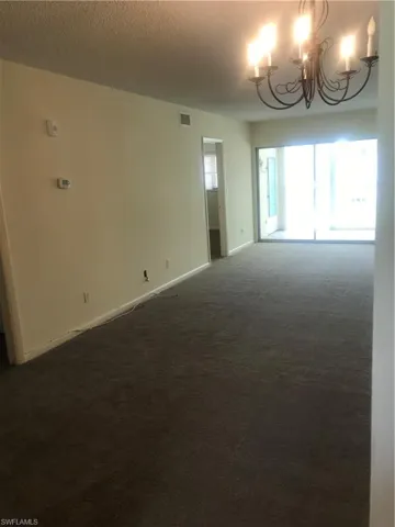 livilng room and dining room carpeted.