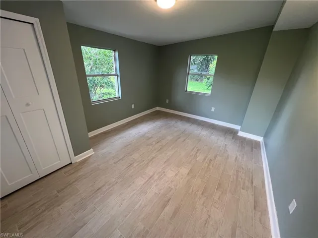 Spare room featuring light hardwood / wood-style floors