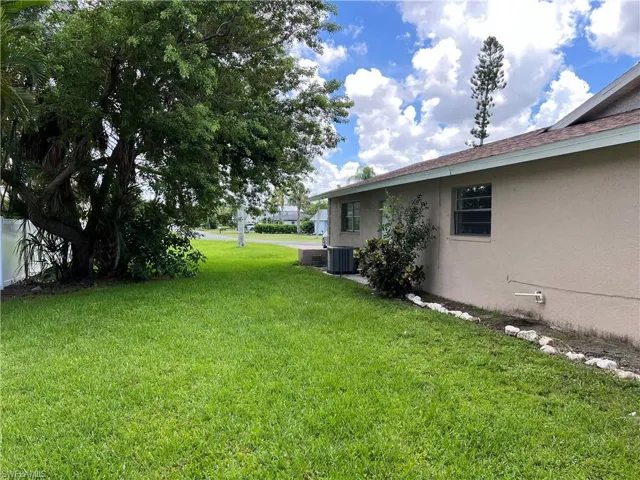 View of yard featuring central AC unit
