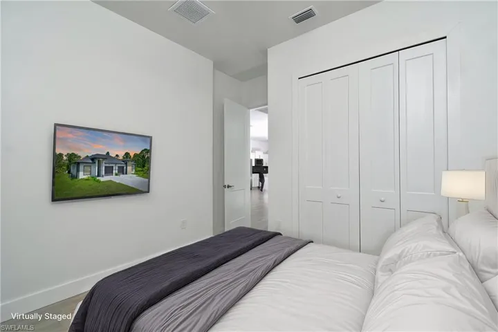 Bedroom featuring a closet and wood finished floors