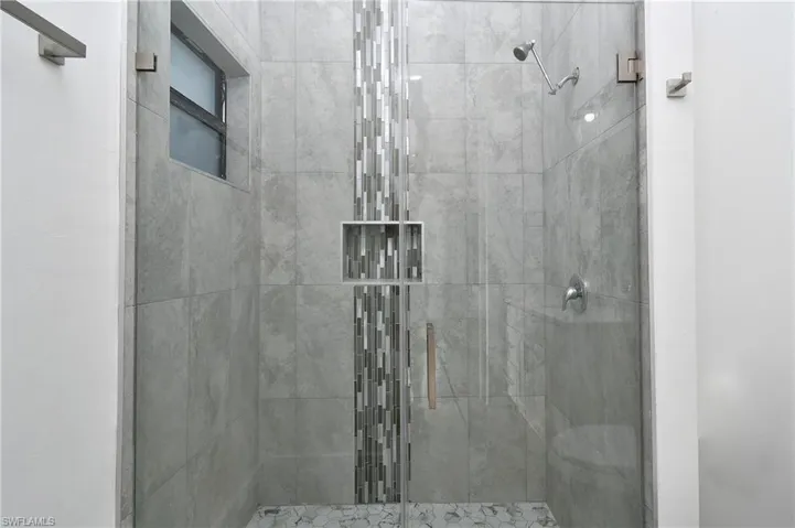 Bathroom featuring a stall shower