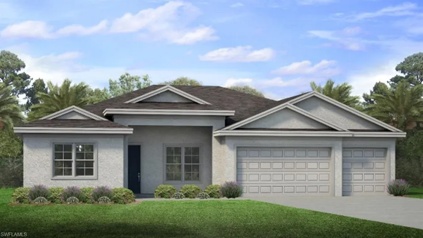 View of front facade featuring a garage and a front yard