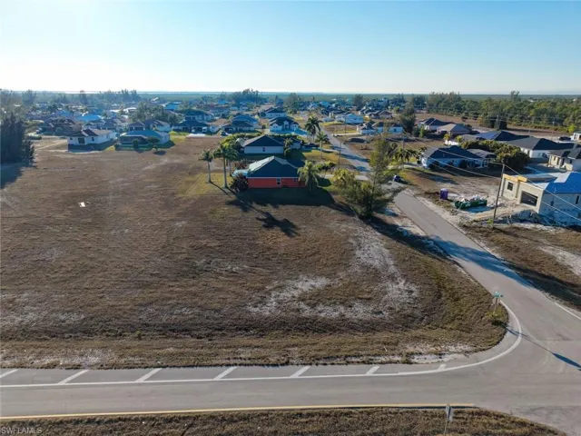 Expansive corner lot featuring a flat topography and visible street access