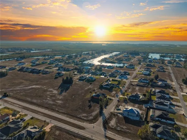 Aerial view of residential area with a large body of water
