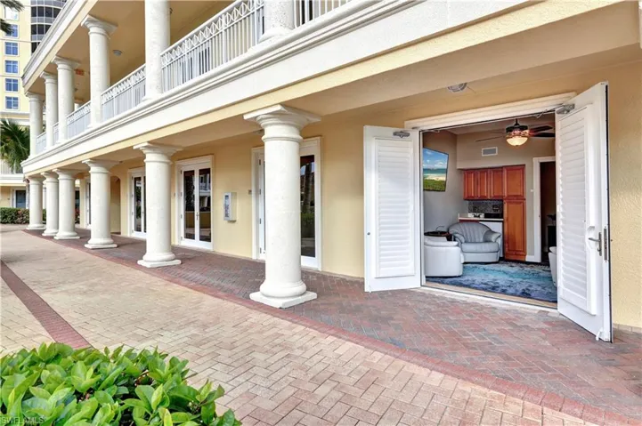 View of exterior entry featuring stucco siding