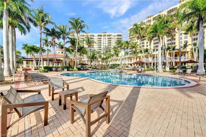 Community pool with a patio area