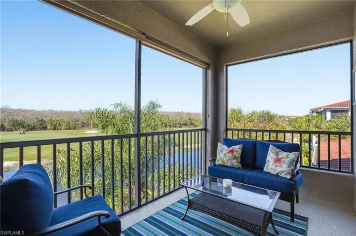 Sunroom / solarium with view of golf course