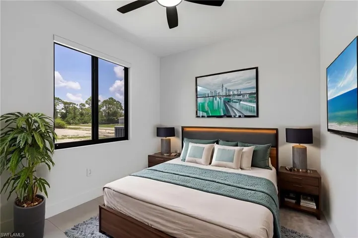 Bedroom featuring baseboards and a ceiling fan