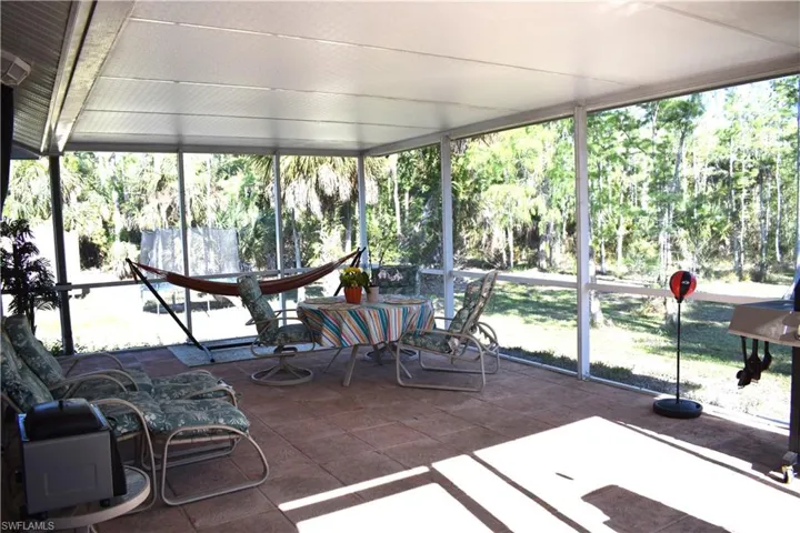 Sunroom featuring a wealth of natural light