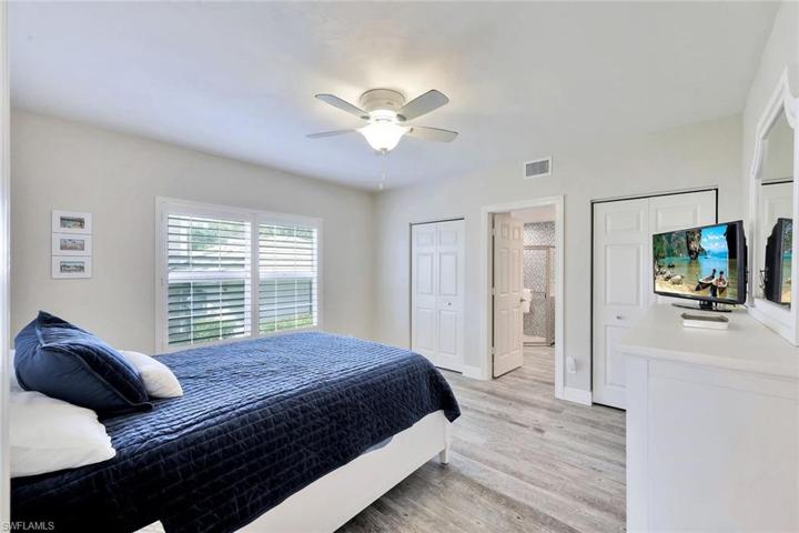 Guest bedroom #2 with plantation shutters and en suite bathroom