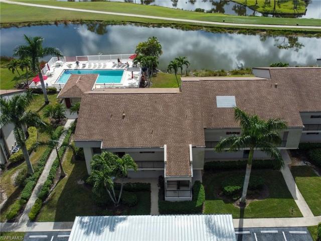 End unit overlooking the pool and lake