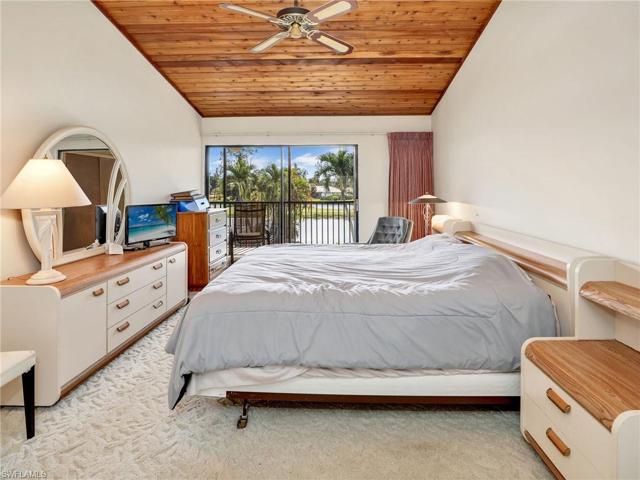 Primary bedroom with sliders to lanai