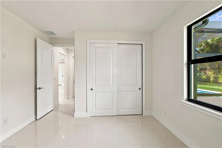 White porcelain tile flooring with a gloss finish