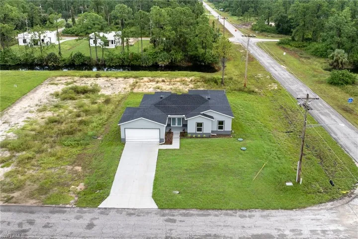 Aerial view of property and surrounding area