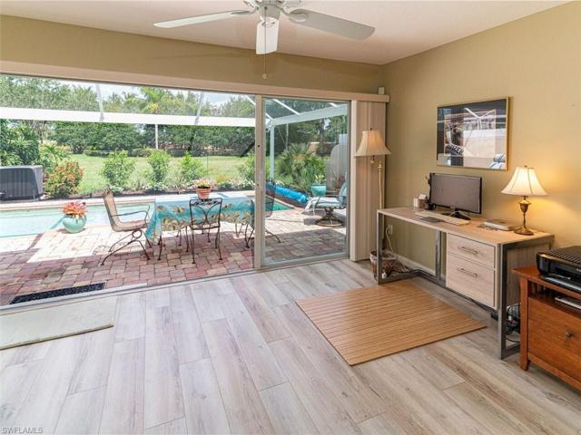 Den with French Doors View of the Pool