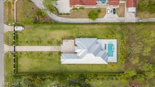 View from above of property with a pool area
