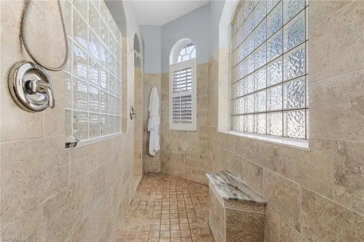 Bathroom with a tile shower