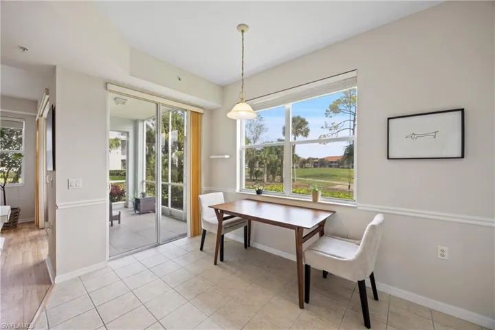 Eat in kitchen with light tile patterned floors